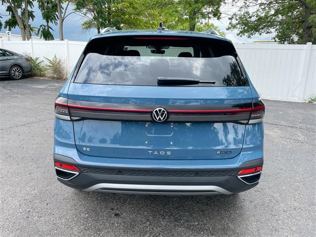 Photo of 2025 Monterey Blue Pearl Volkswagen Taos