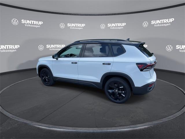 Photo of 2025 Pure White W/ Deep Blue R Volkswagen Taos