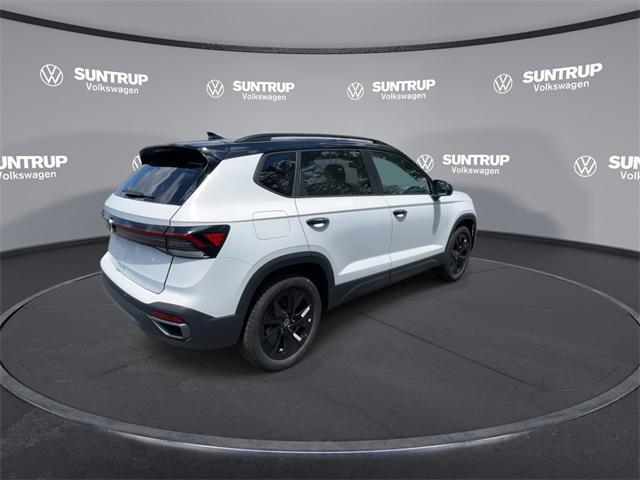 Photo of 2025 Pure White W/ Deep Blue R Volkswagen Taos