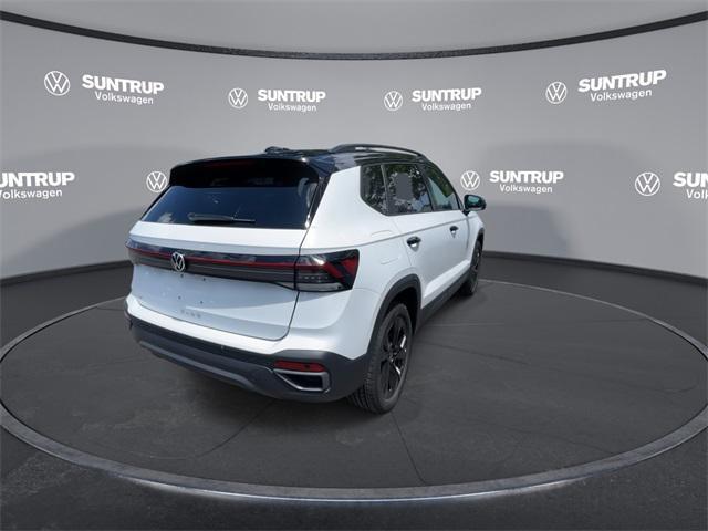 Photo of 2025 Pure White W/ Deep Blue R Volkswagen Taos