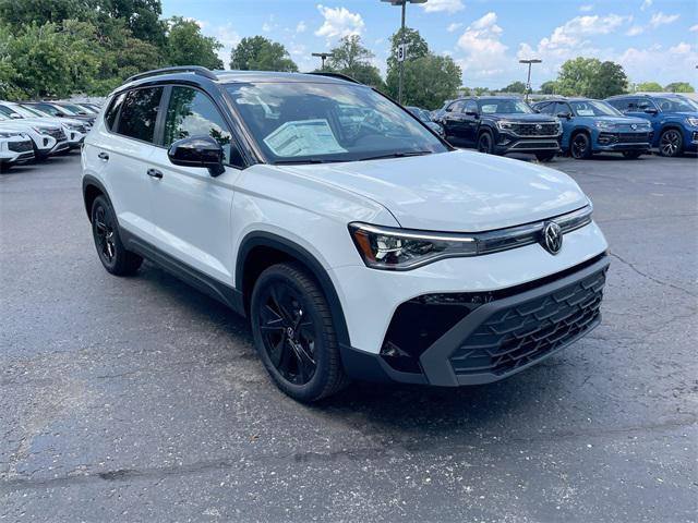 Photo of 2025 Pure White W/ Deep Blue R Volkswagen Taos