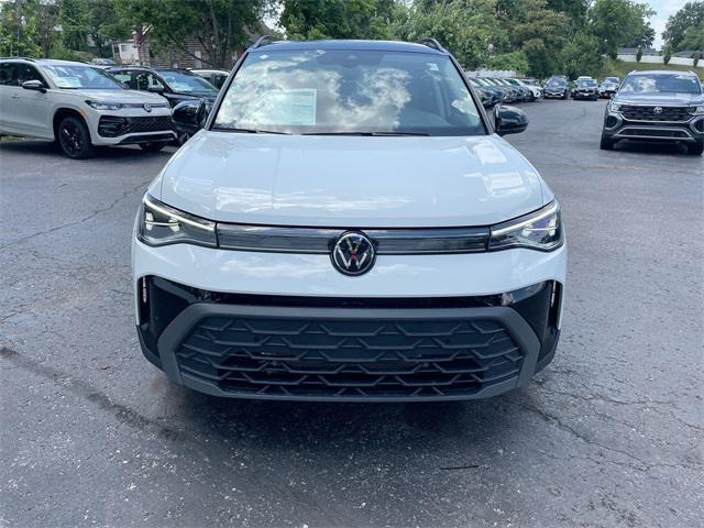 Photo of 2025 Pure White W/ Deep Blue R Volkswagen Taos