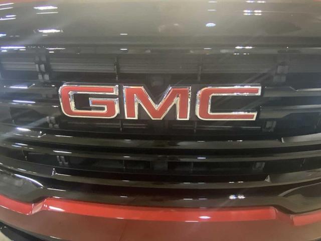 Photo of 2023 Volcanic Red GMC Acadia
