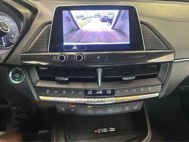 Photo of 2024 Summit White Cadillac CT4