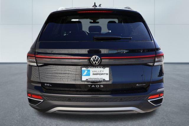 Photo of 2025 Deep Black Volkswagen Taos