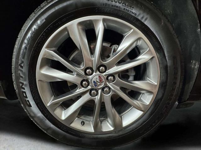 Photo of 2023 Rich Garnet Metallic Buick Enclave