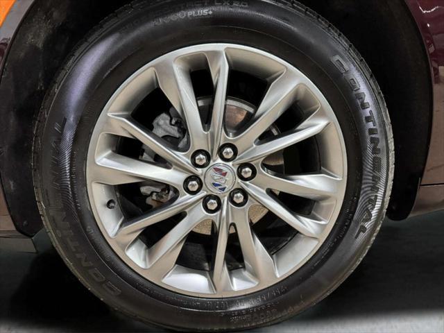 Photo of 2023 Rich Garnet Metallic Buick Enclave