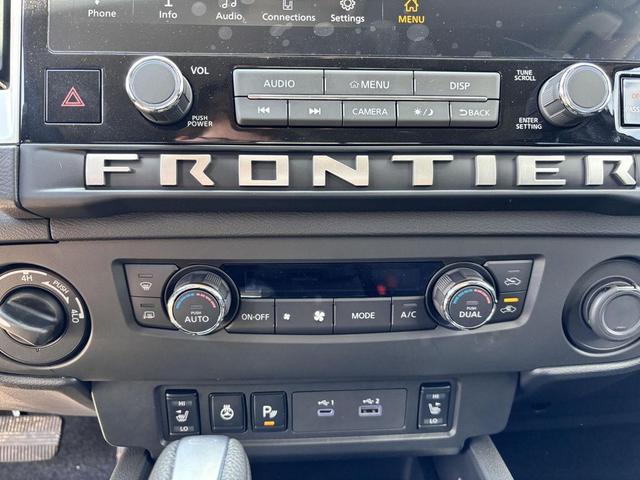 Photo of 2025 Glacier White Nissan Frontier