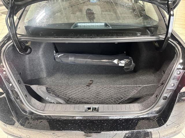 Photo of 2025 Super Black Metallic Nissan Versa