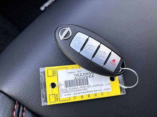 Photo of 2025 Boulder Gray Pearl Nissan Frontier