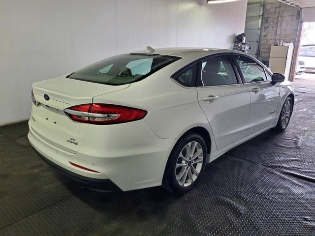 Photo of 2019 White Ford Fusion Hybrid