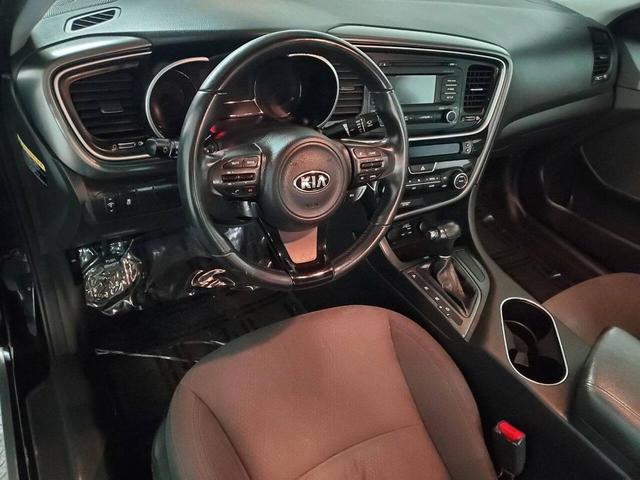 Photo of 2015 Aurora Black Pearl Kia Optima Hybrid