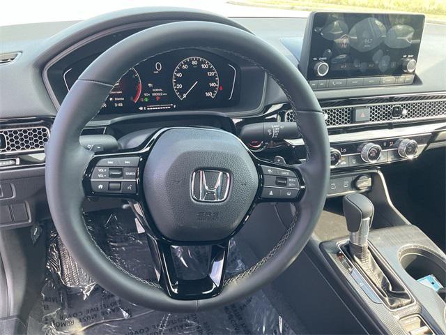 Photo of 2026 Blue Lagoon Pearl Honda Civic