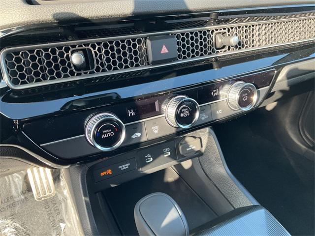 Photo of 2025 Blue Lagoon Pearl Honda Civic