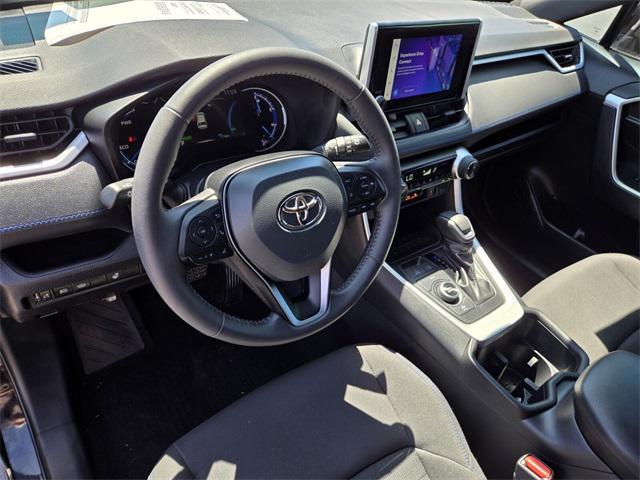 Photo of 2024 Midnight Black Metallic Toyota RAV4 Hybrid