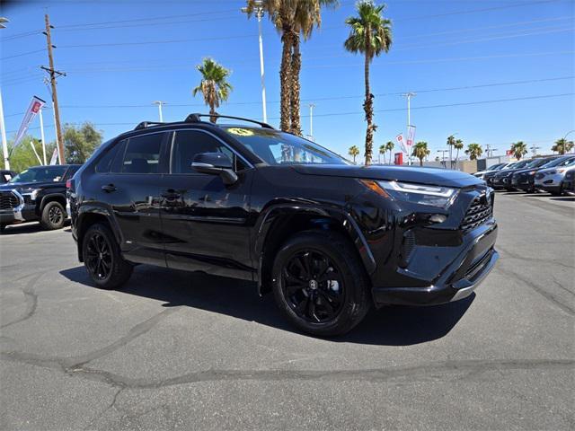 Photo of 2024 Midnight Black Metallic Toyota RAV4 Hybrid
