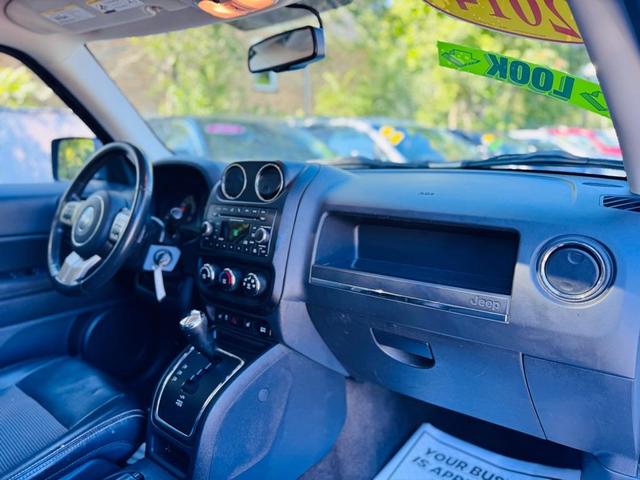 Photo of 2014 White Jeep Patriot