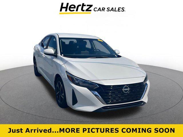 Photo of 2024 Aspen White Tricoat Nissan Sentra