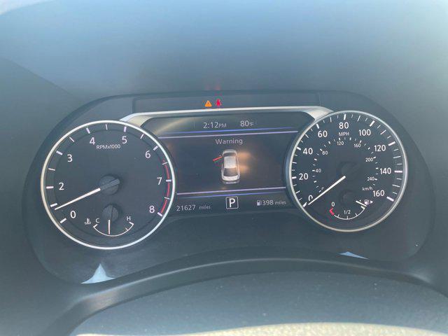 Photo of 2024 Aspen White Tricoat Nissan Sentra