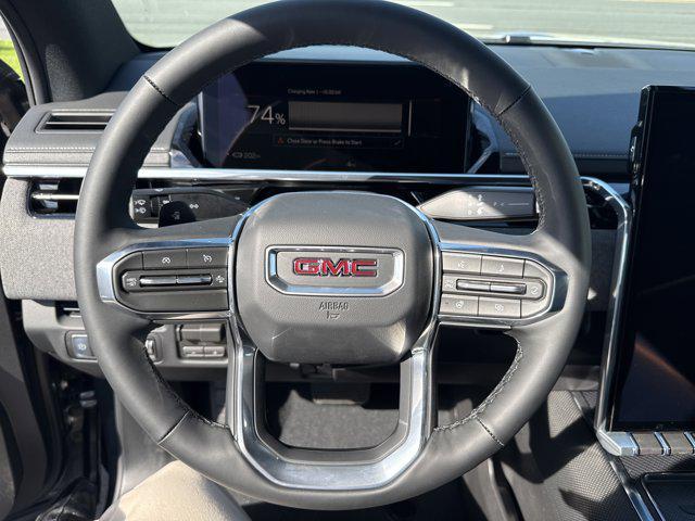 Photo of 2026 Deep Ocean Metallic GMC Sierra EV