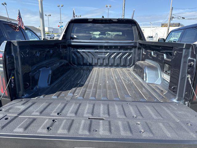 Photo of 2026 Deep Ocean Metallic GMC Sierra EV