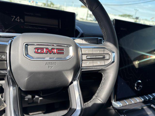 Photo of 2026 Deep Ocean Metallic GMC Sierra EV