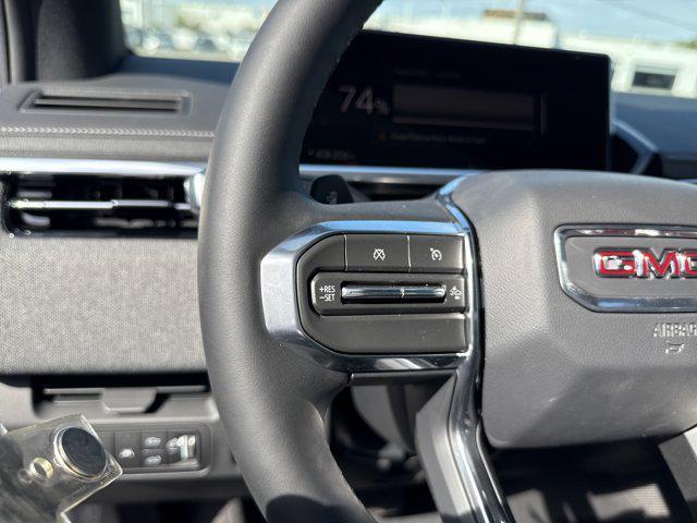 Photo of 2026 Deep Ocean Metallic GMC Sierra EV