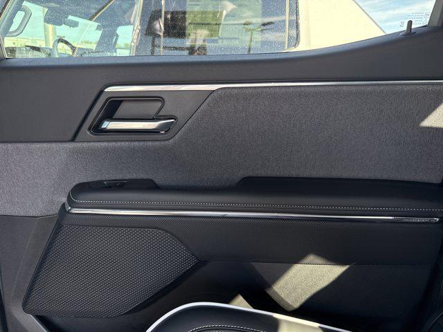 Photo of 2026 Deep Ocean Metallic GMC Sierra EV
