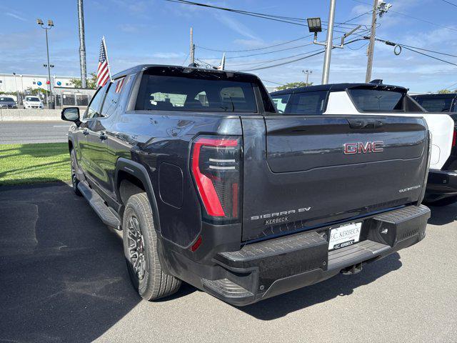 Photo of 2026 Deep Ocean Metallic GMC Sierra EV