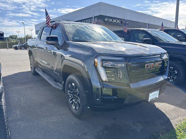 Photo of 2026 Deep Ocean Metallic GMC Sierra EV