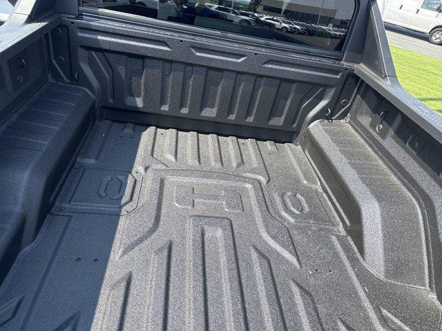 Photo of 2025 Graphite Blue Metallic GMC HUMMER EV Pickup