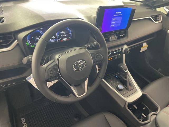 Photo of 2025 Silver Sky/Midnight Black Toyota RAV4 Hybrid