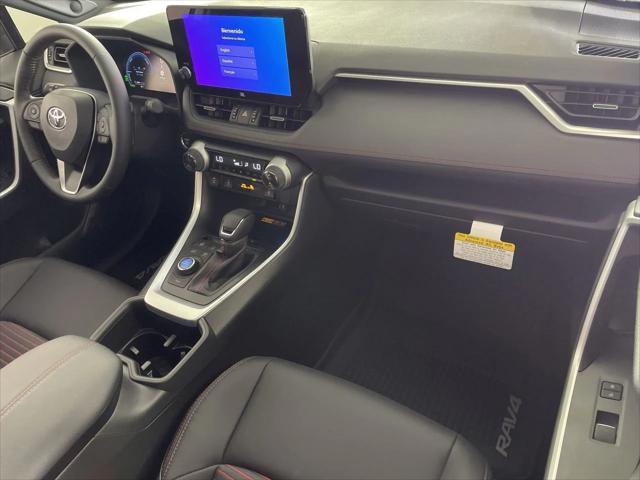 Photo of 2025 Silver Sky/Midnight Black Toyota RAV4 Hybrid