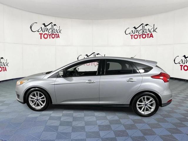 Photo of 2015 Ingot Silver Ford Focus