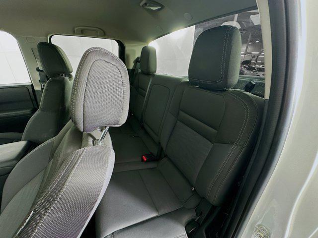 Photo of 2023 Glacier White Nissan Frontier