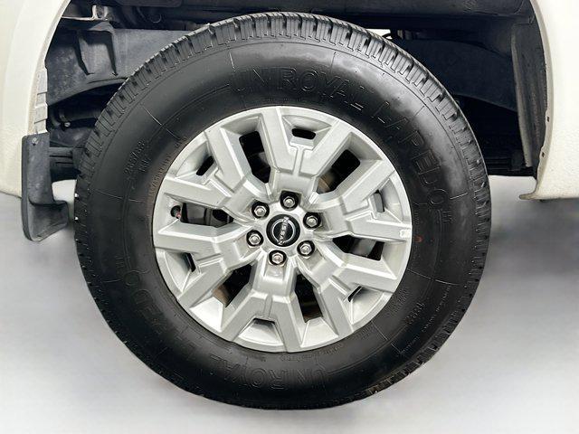 Photo of 2023 Glacier White Nissan Frontier