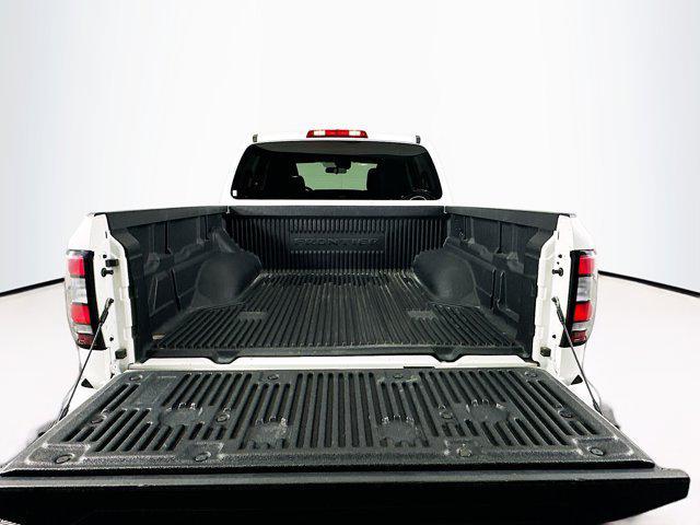 Photo of 2023 Glacier White Nissan Frontier