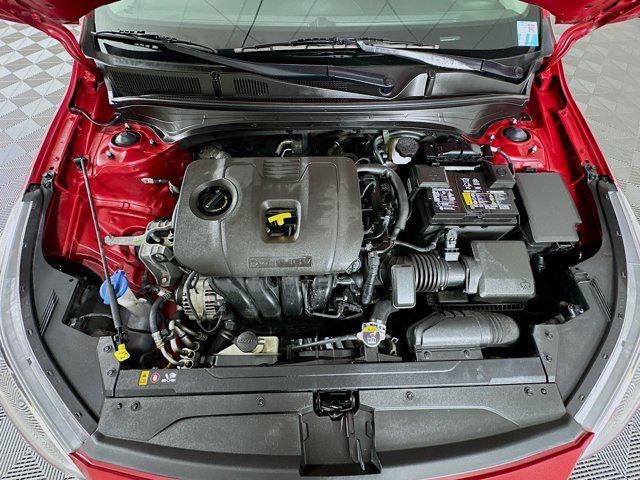 Photo of 2021 Currant Red Kia Forte