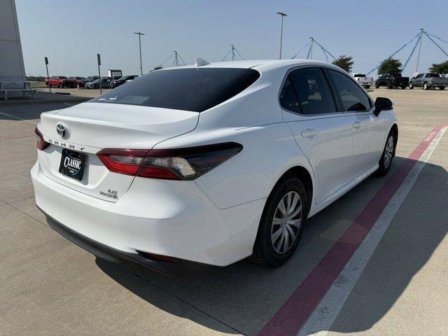 Photo of 2022 White Toyota Camry Hybrid
