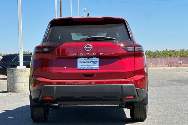 Photo of 2026 Scarlet Ember Tintcoat Nissan Rogue