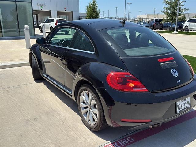 Photo of 2013 Black Uni Volkswagen Beetle