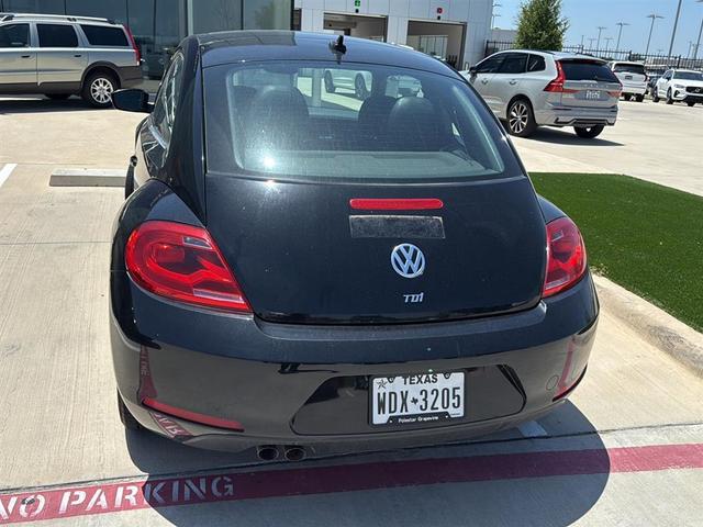 Photo of 2013 Black Uni Volkswagen Beetle