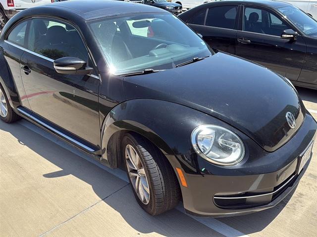 Photo of 2013 Black Uni Volkswagen Beetle