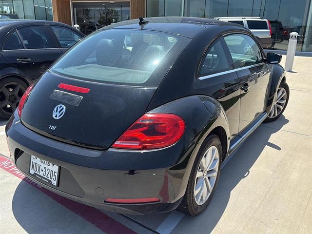 Photo of 2013 Black Uni Volkswagen Beetle