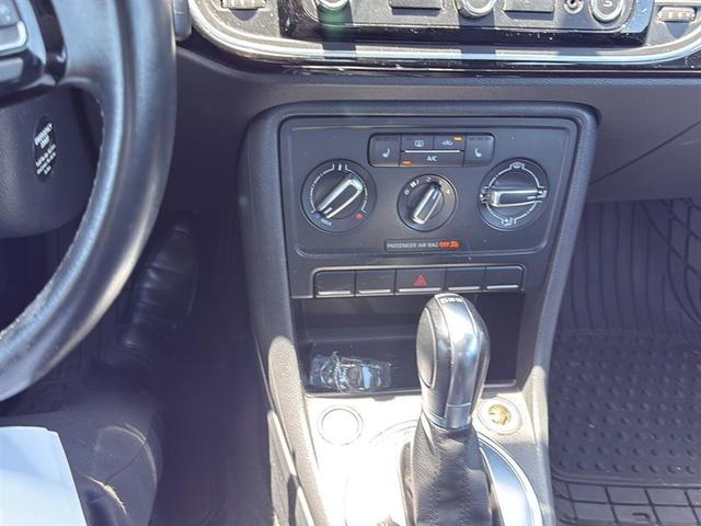 Photo of 2013 Black Uni Volkswagen Beetle