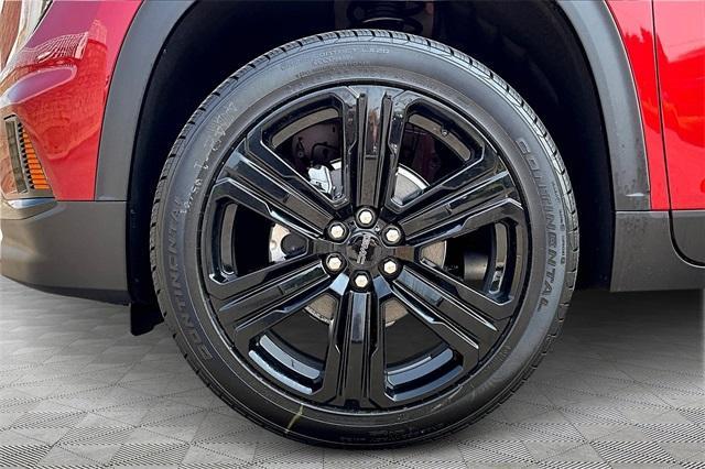 Photo of 2025 Volcanic Red GMC Acadia