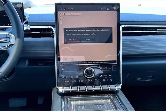 Photo of 2025 Summit White GMC Sierra EV