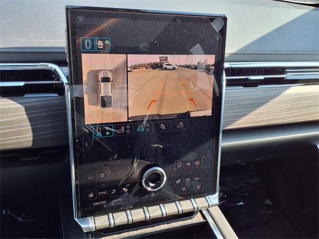 Photo of 2025 Summit White GMC Sierra EV