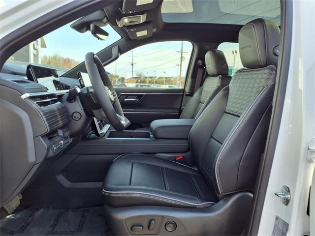 Photo of 2025 Summit White GMC Sierra EV