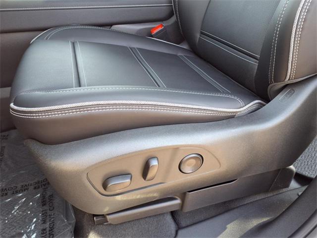Photo of 2025 Summit White GMC Sierra EV